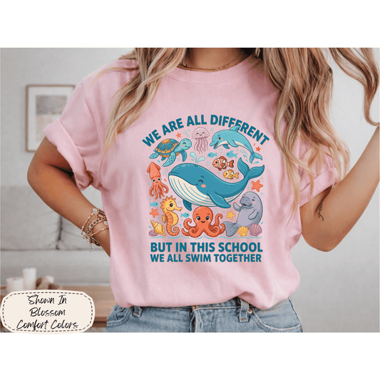Classroom Community | We All Swim Together Graphic Tee
